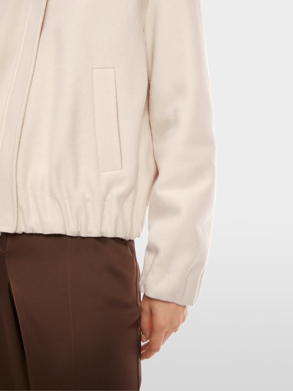Marc Cain Jacke aus 100 % Wolle Knitted in Germany Bis zu 50% Rabatt
