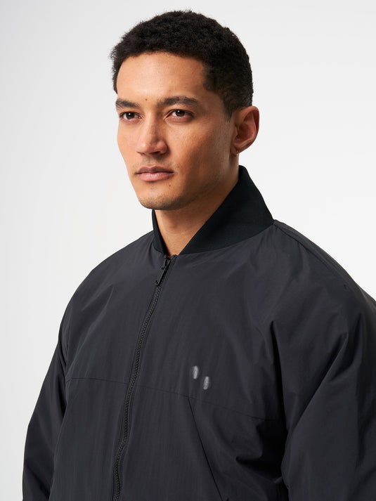 Pinqponq Light Bomber Jacket - Peat Black (Unisex) Bis zu 65% Rabatt